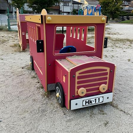 Апартаменты ザミッキーカールトン井尻102 Shiobaru Экстерьер фото