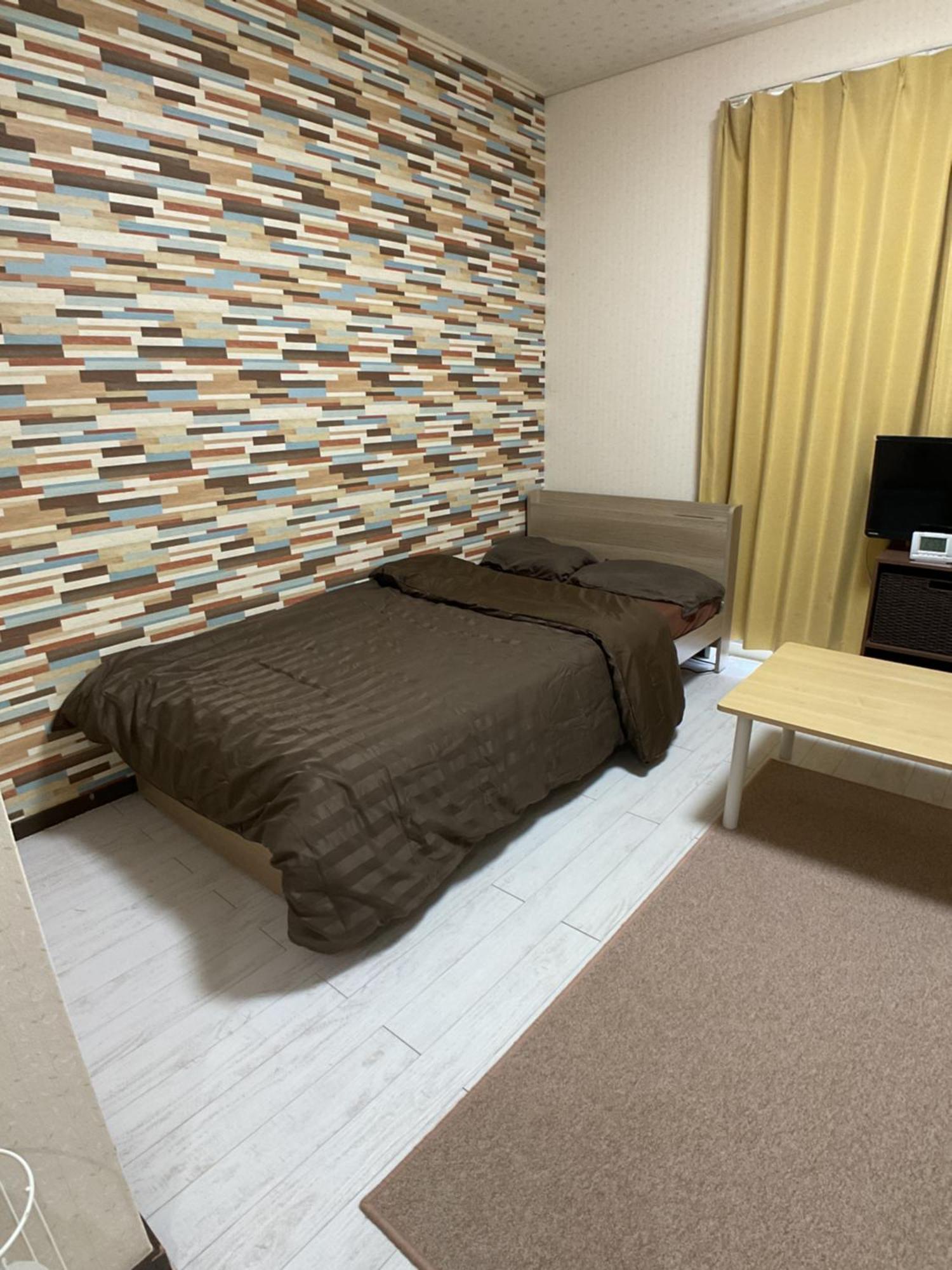 Апартаменты ザミッキーカールトン井尻102 Shiobaru Экстерьер фото